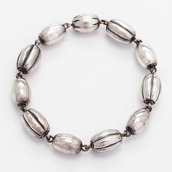 Kalevala Koru, "Halikon kääty", necklace and bracelet, silver, 1988.