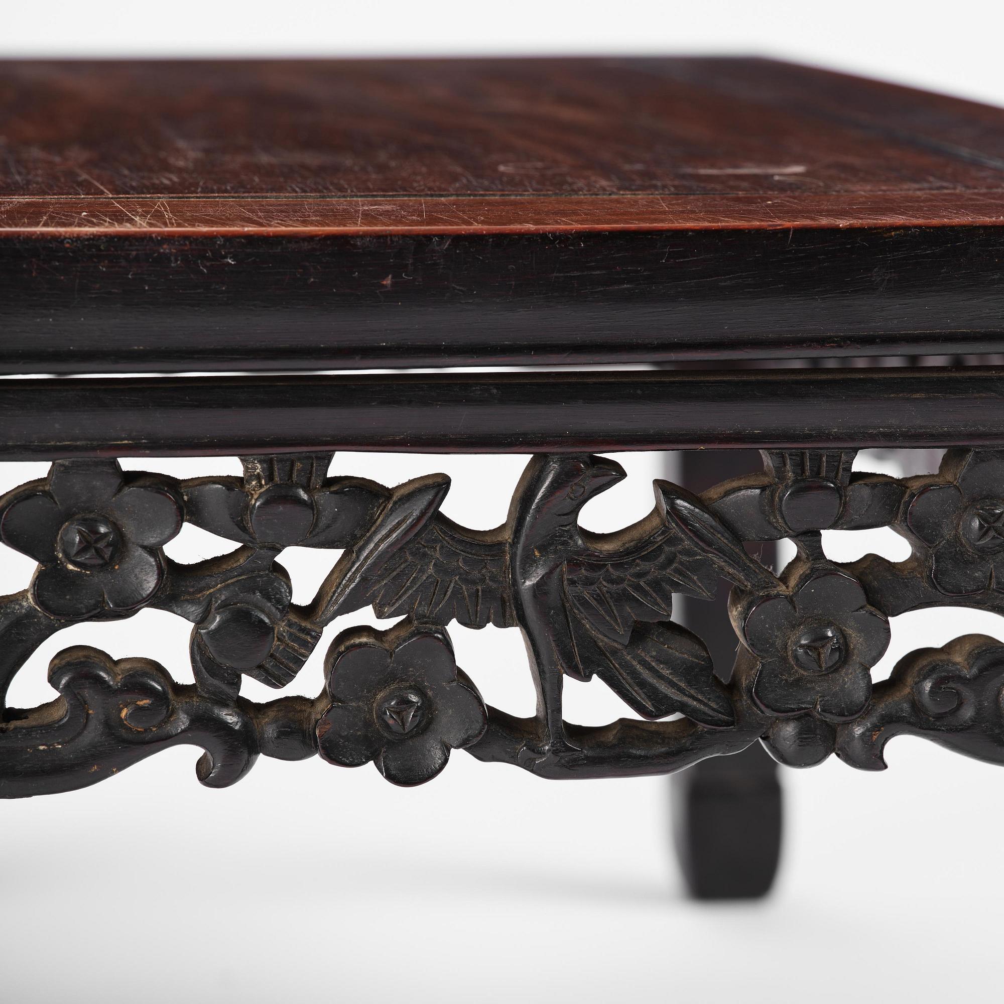 A Chinese hardwood kang table, late Qing dynasty.