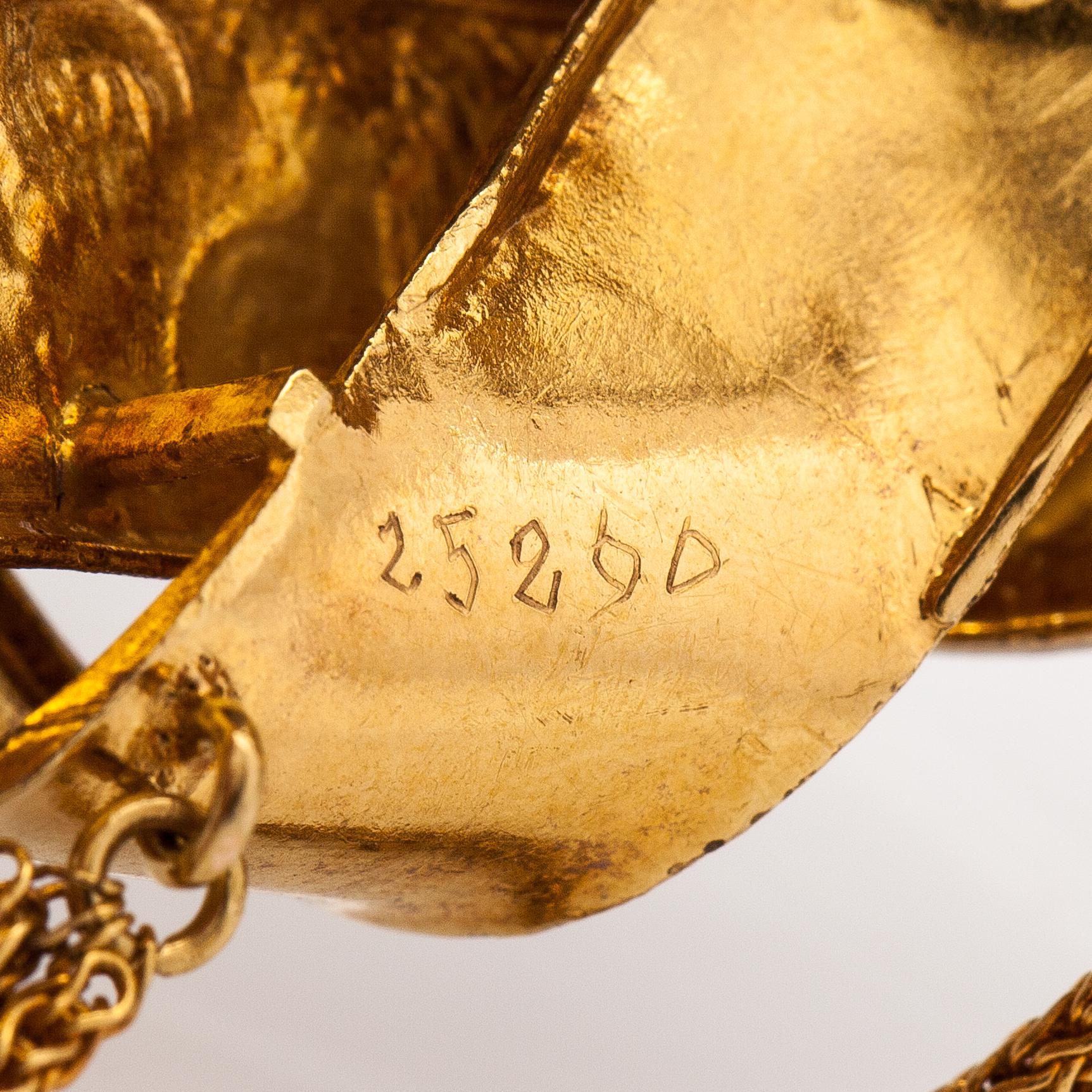 Hänge/brosch, 18K guld och granater. Sekelskiftet 1800/1900.