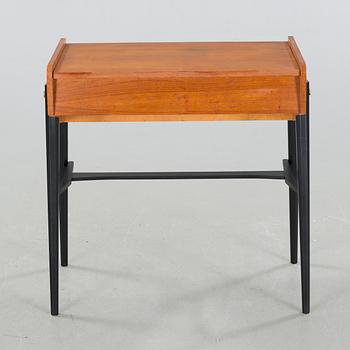 A mid 20th century dressing table and stool.