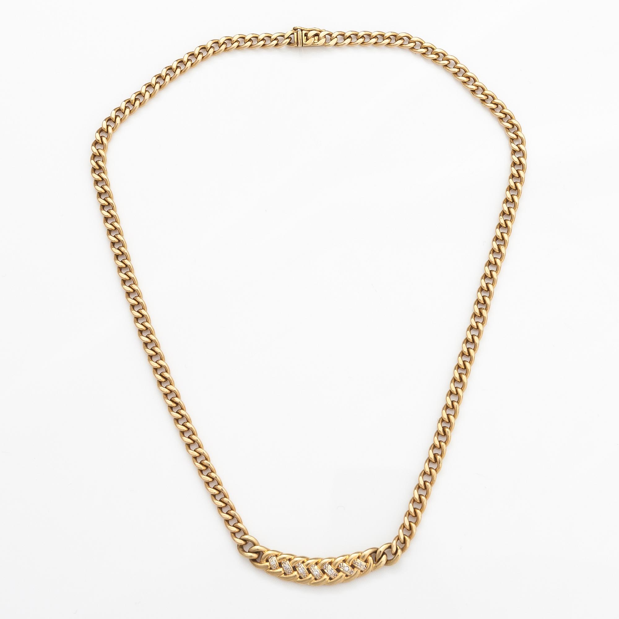 A 14K gold necklace with diamonds ca 0.035 ct in total.