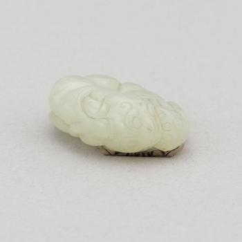 A Chinese nephrite figure in the shape of a shrimp, presumably around the year 1900.