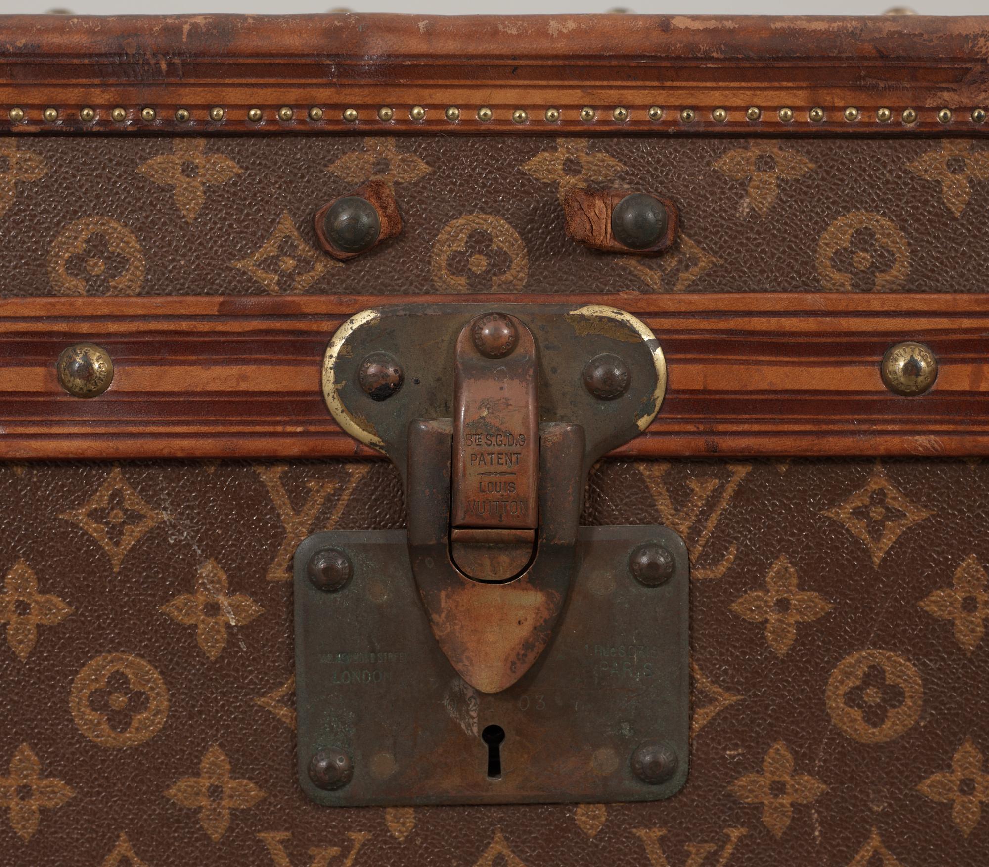 An early 20th cent monogram canvas trunk by Louis Vuitton.