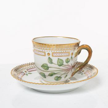 Royal Copenhagen, cream jug with lid and saucer, as well as coffee cup with saucer, porcelain, Flora Danica, Denmark.