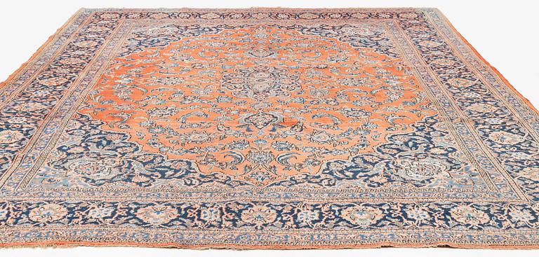 A carpet, semi-antique Keshan, ca. 420 x 319 cm.