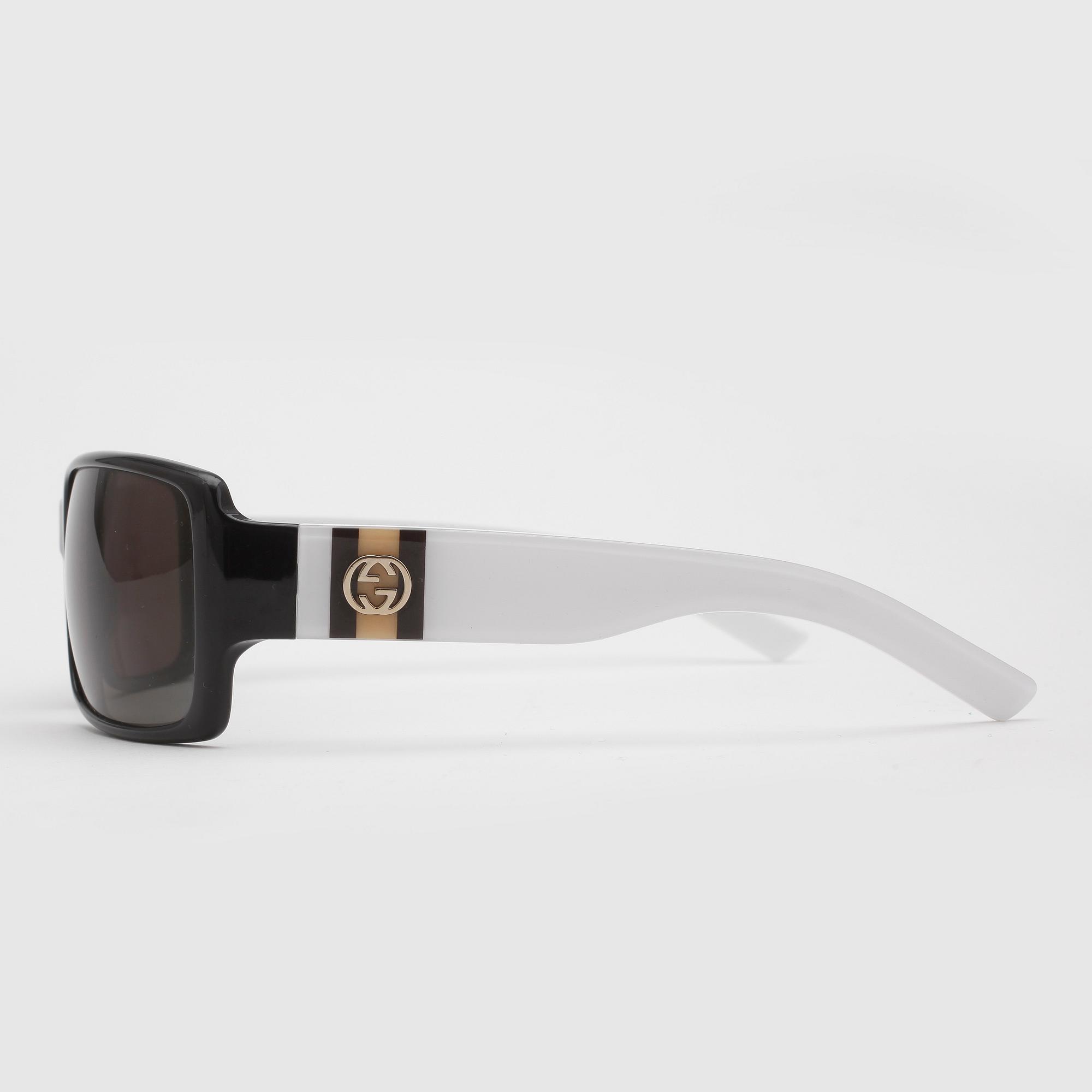 SOLGLASÖGON, Gucci.