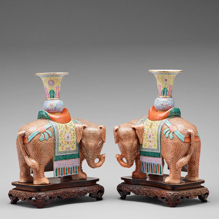 A pair of famille rose caparisoned elephants, Qing dynasty, Jiaqing (1796-1822).