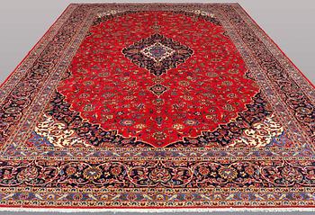 A signed Kashan carpet ca 490 x 289 cm.