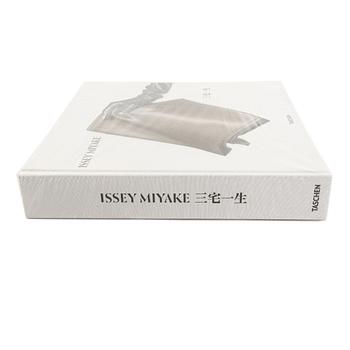 An Issey Miyake monograph published by Taschen, limited edition, in original box and wrapping.