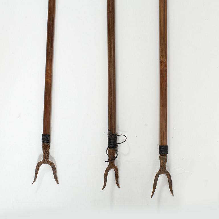 A Japanese three piece bow and arrow set, from various ages.