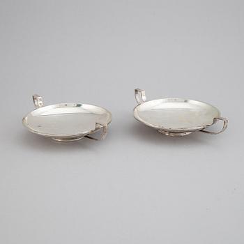 A pair of sterling silver tazzaz.