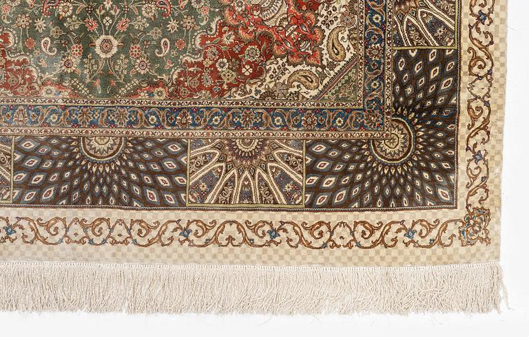 A silk Qum, Central Persia. signed Mohammad Gamshidi, c. 203 x 126 cm.