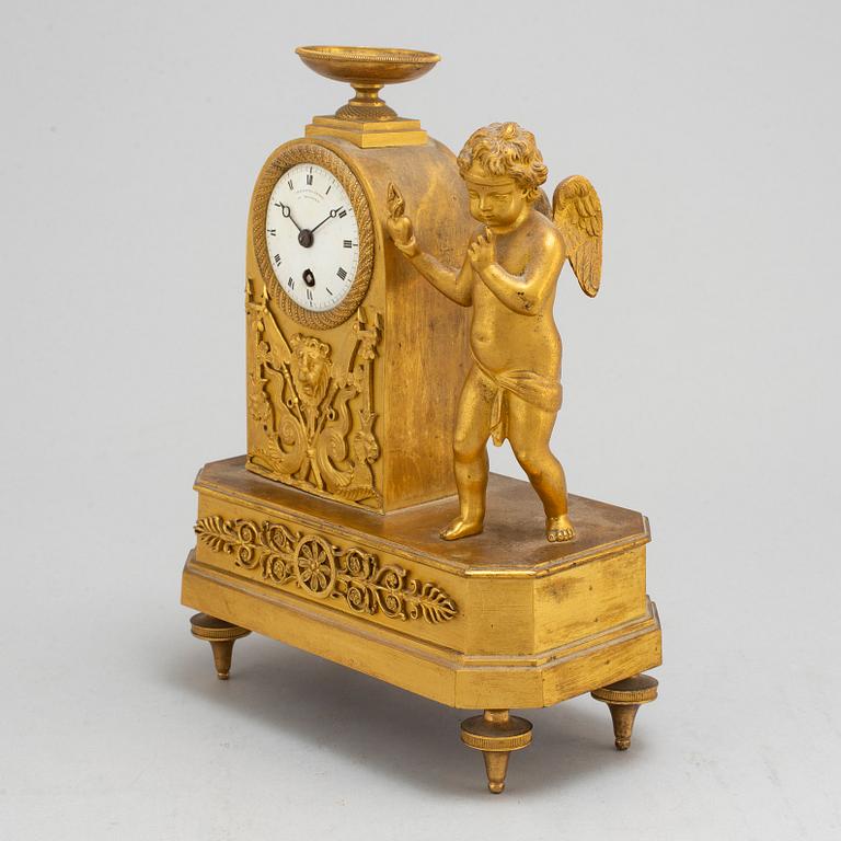 A German Empire mantel clock, early 19th century.