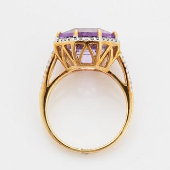 An amethyst ring.
