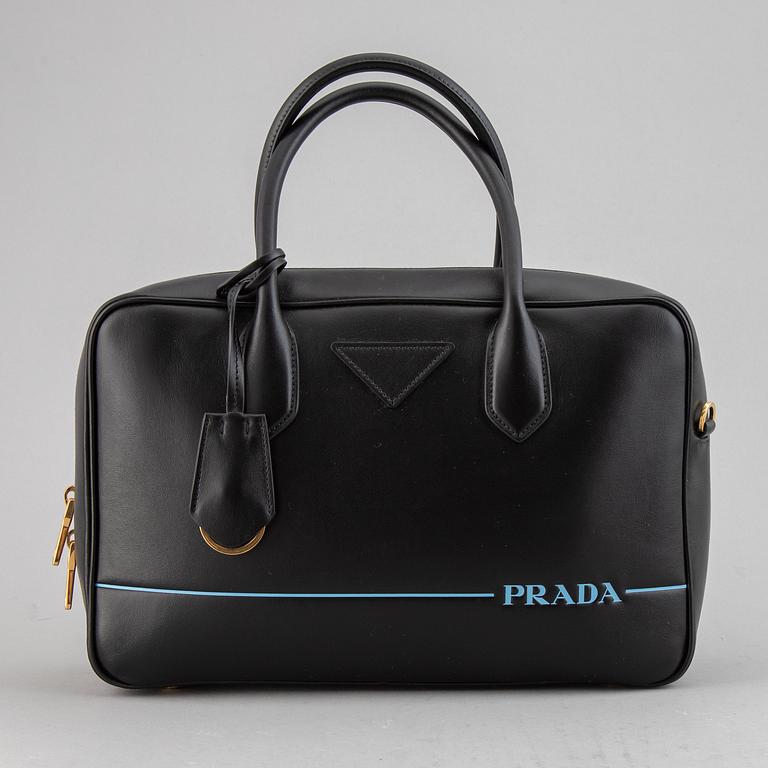 PRADA, a leather bag.