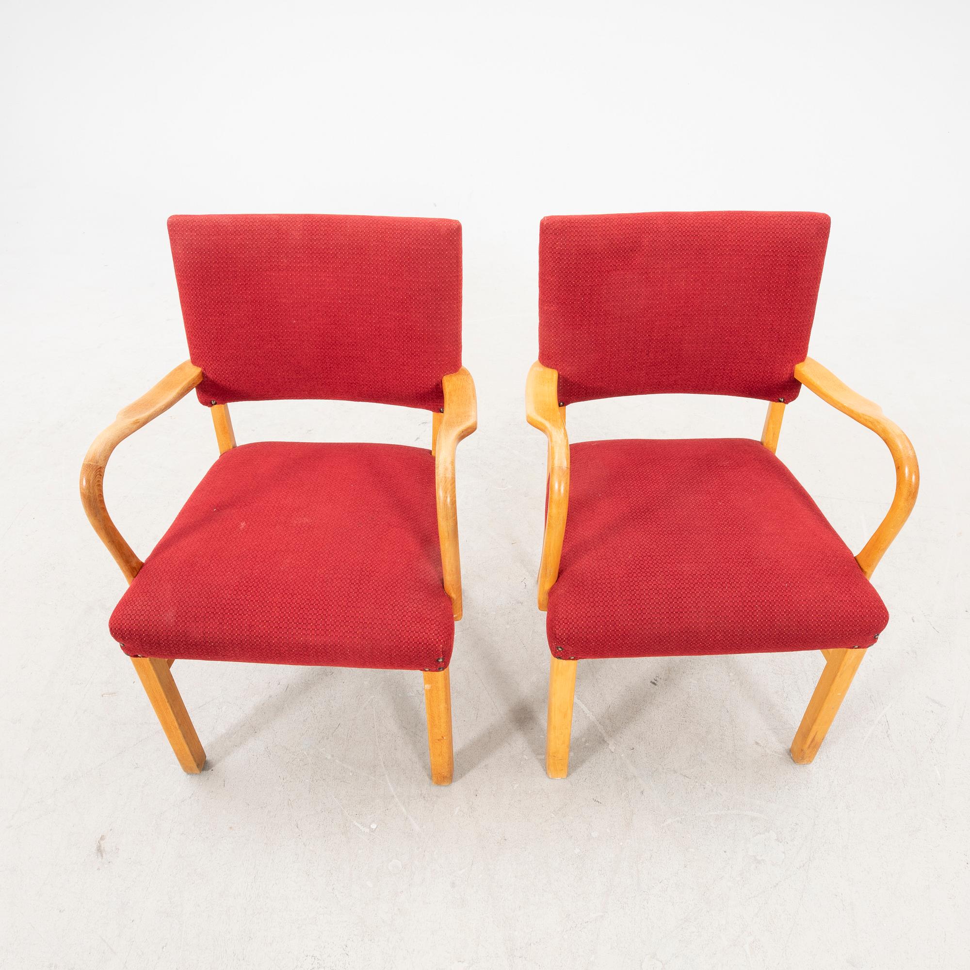 A pair of 1940s armchairs.