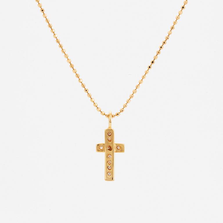 Efva Attling, 18K gold and brilliant-cut diamond cross pendant.