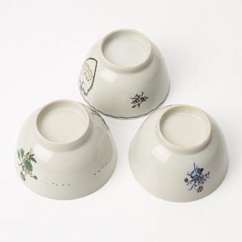 A group of nine Chinese export porcelain cups with stands, Qing dynasty, late 18th century.