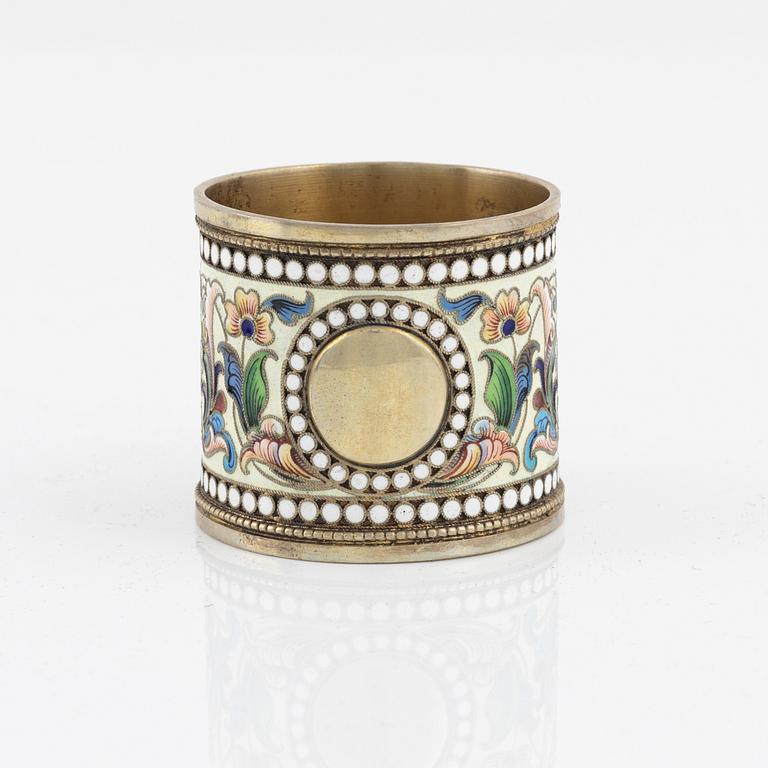 A Russian silver-gilt and cloisonné enamel napkin ring, unidentified makers mark, Moscow 1899-1908.