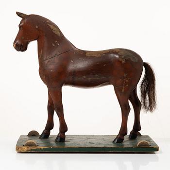 A toy horse, early 20th century.