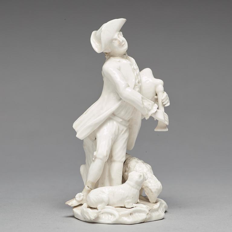 A Swedish Marieberg soft paste figure of a bag-piper, 18th Century.