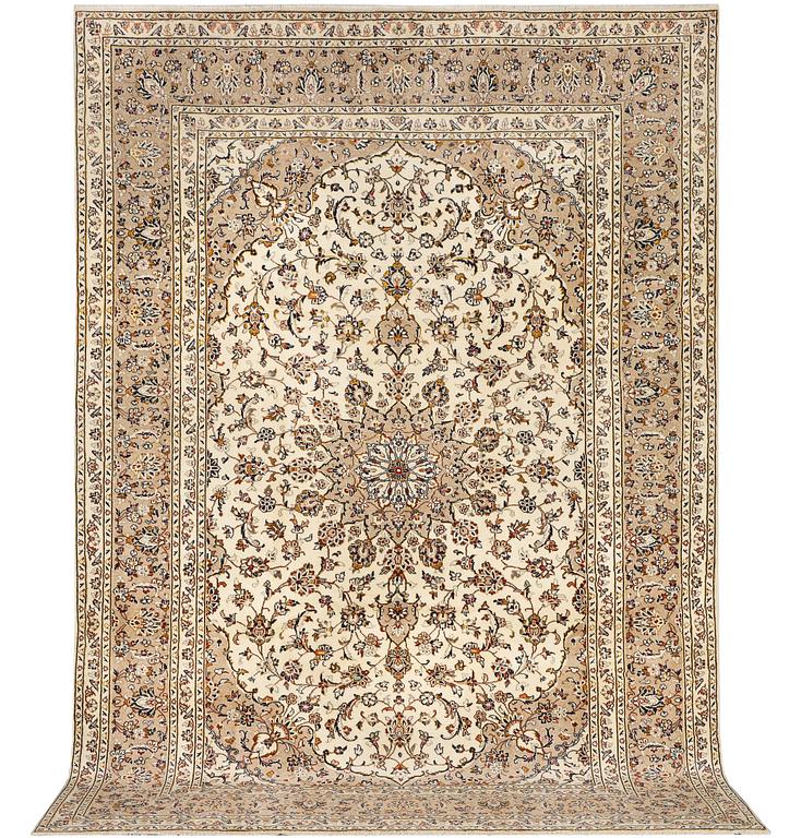 A Keshan carpet, c. 355 x 240 cm.