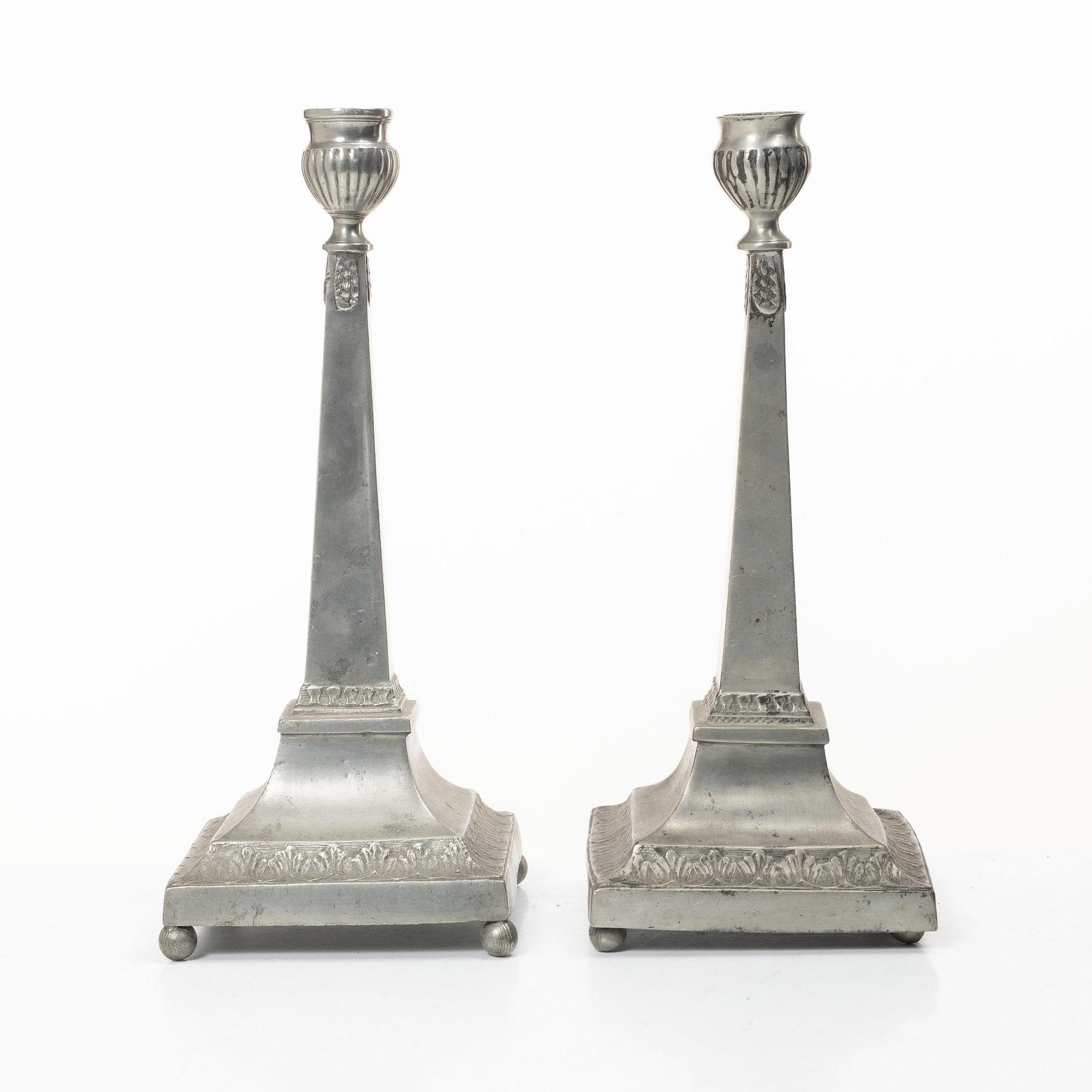 A pair of peuter candlesticks by Petter Höijer, Örebro (1796-1819).