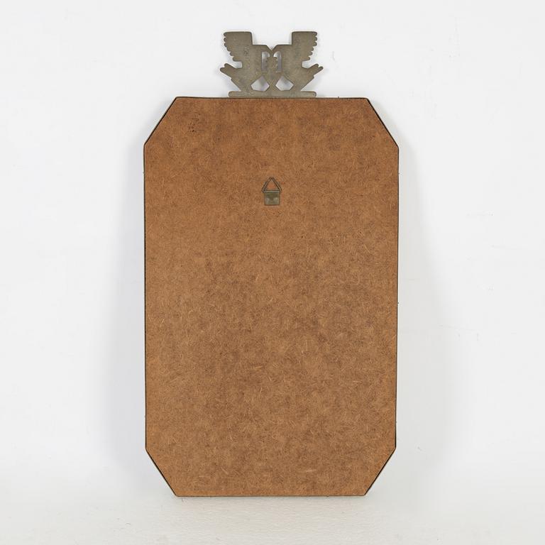 A Swedish pewter mirror, 1934.