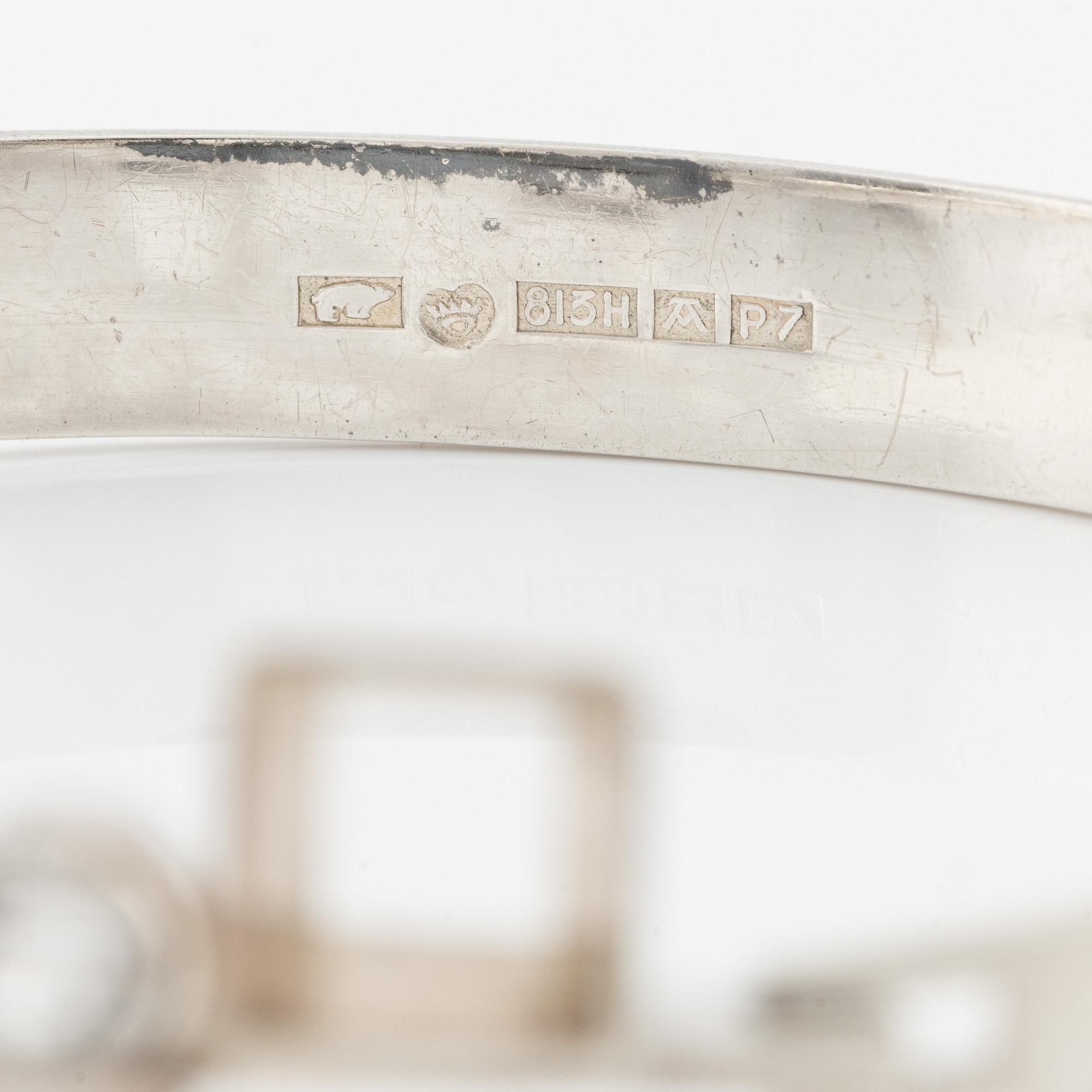 Bangle, Kultasepät Salovaara, silver with white synthetic stones. Turku/Åbo 1968.