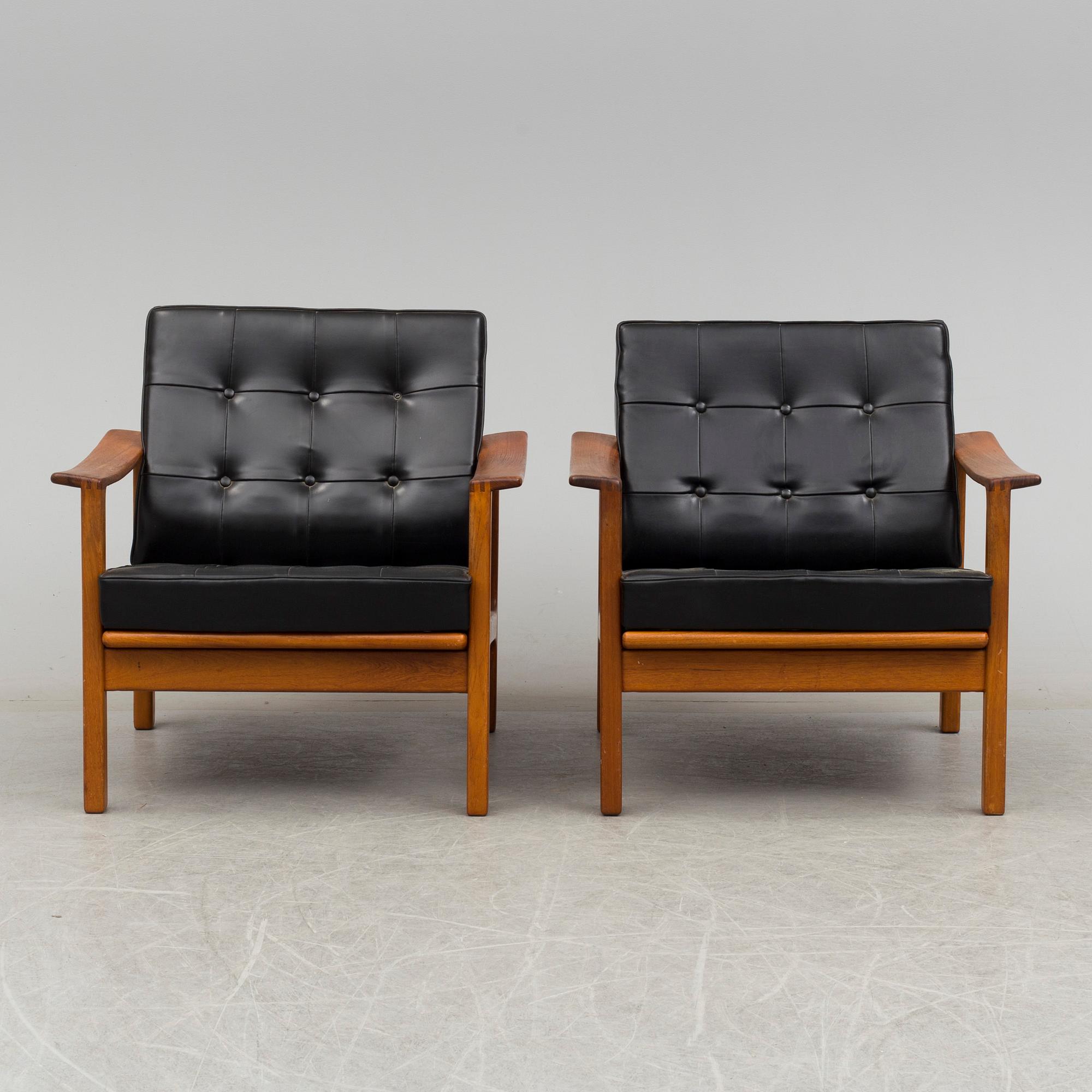 a pair of 1960's armchairs.
