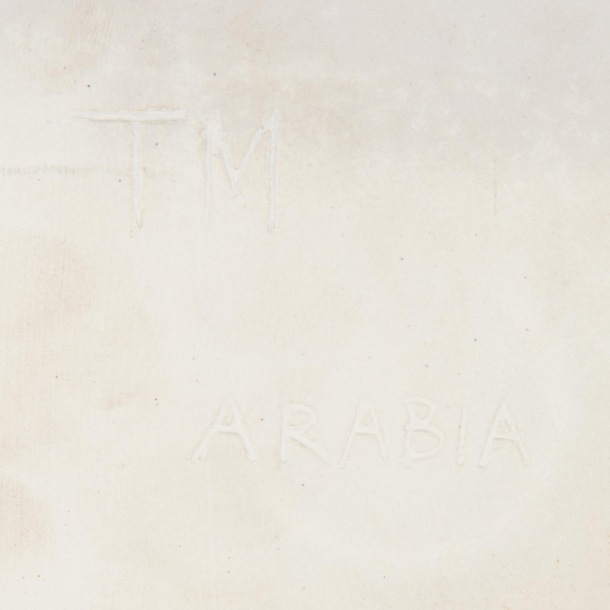 Toini Muona, a stoneware relief for Arabia, signed TM Arabia.