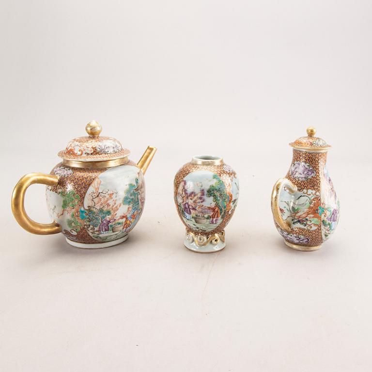 A Chinese Qianlong porcelain teapot, creamer and tea caddy.