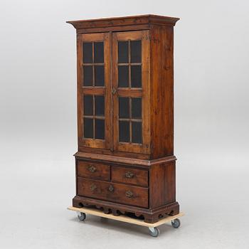 A 18th century vitrine cabinet.