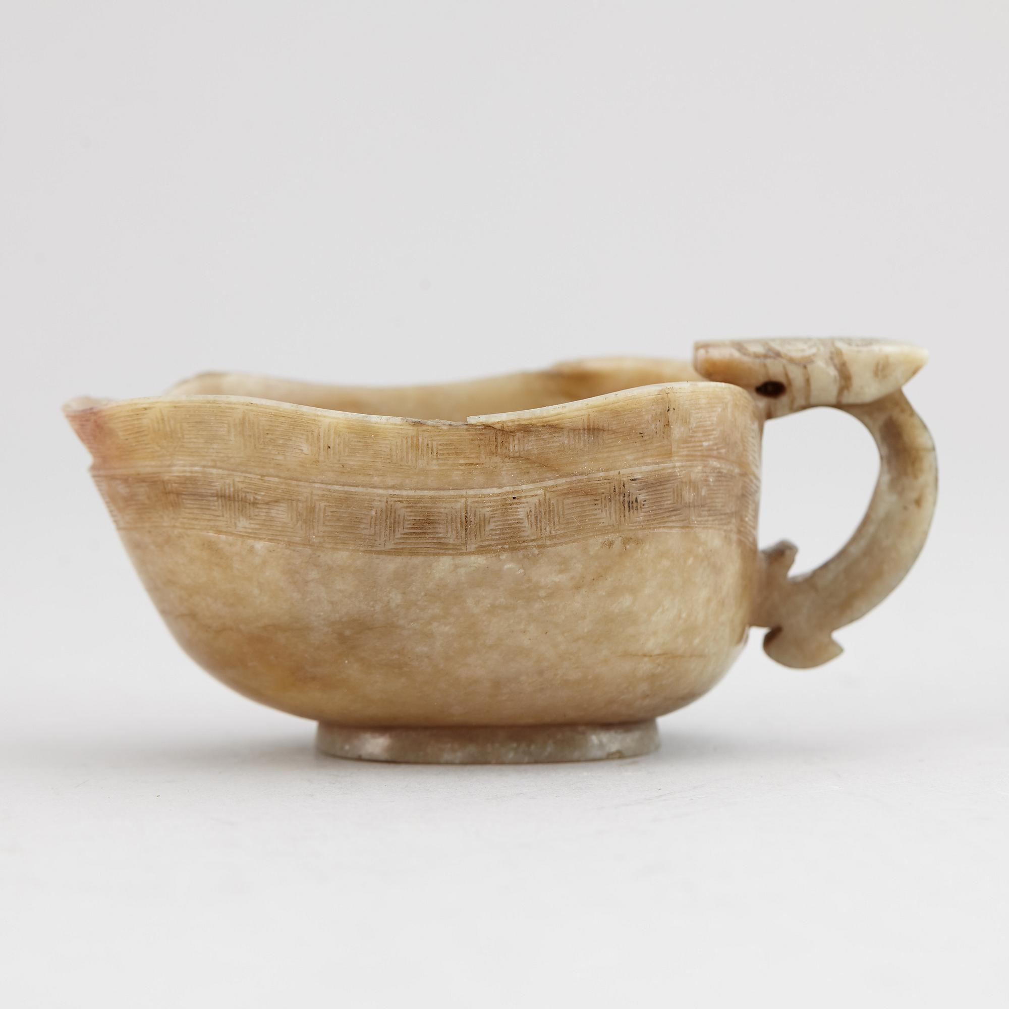 A group of three nephrite objects, Qing dynasty.