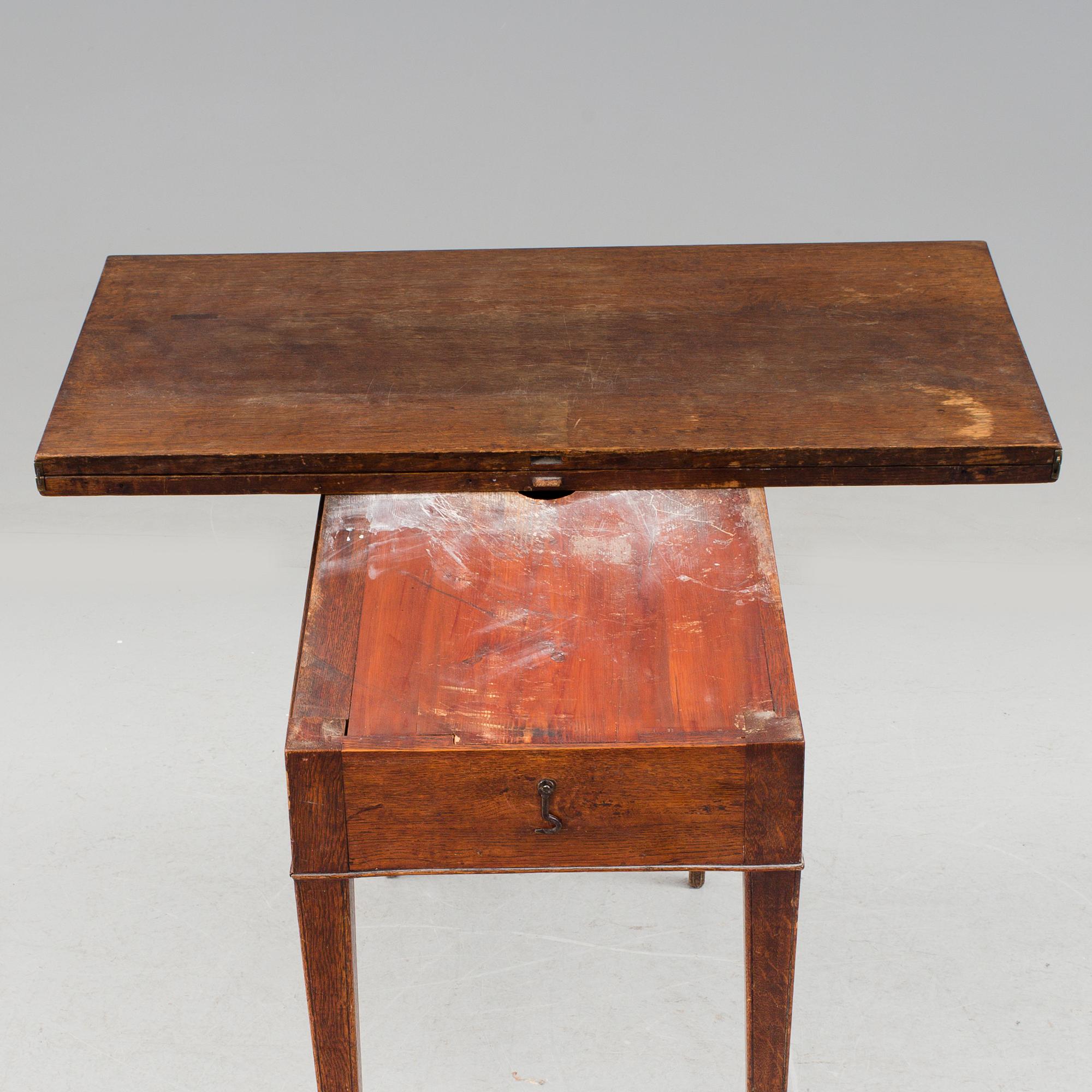 A late gustavian table by Jonas Lidströmer. Signed and dated 1779.