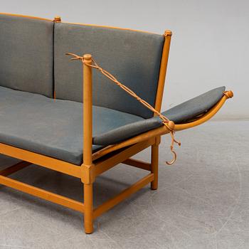 A "Tremme" sofa and armchair, designed by Børge Mogensen, Fritz Hansen, second half of the 20th century.