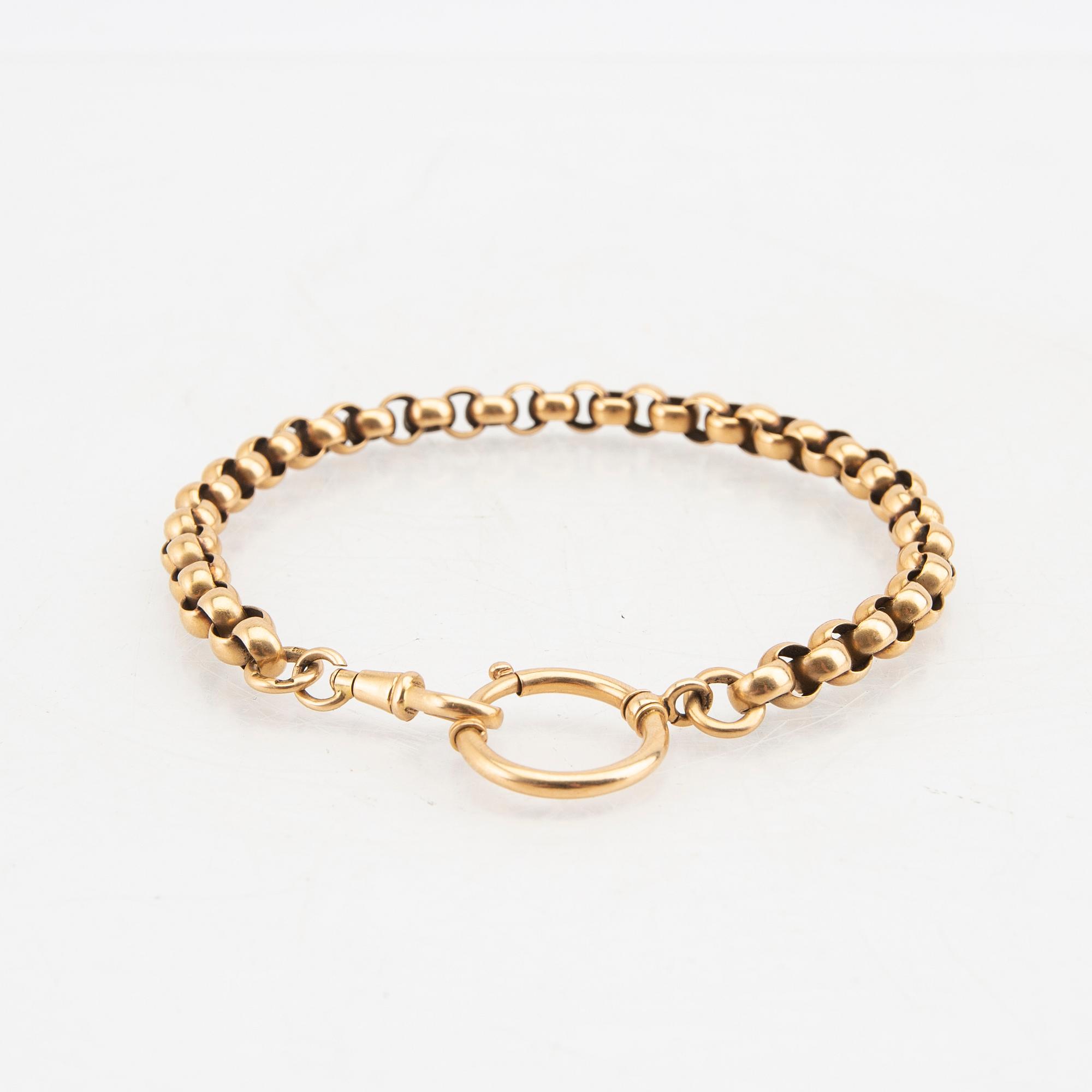 An 18K gold watch chain from year 1900.