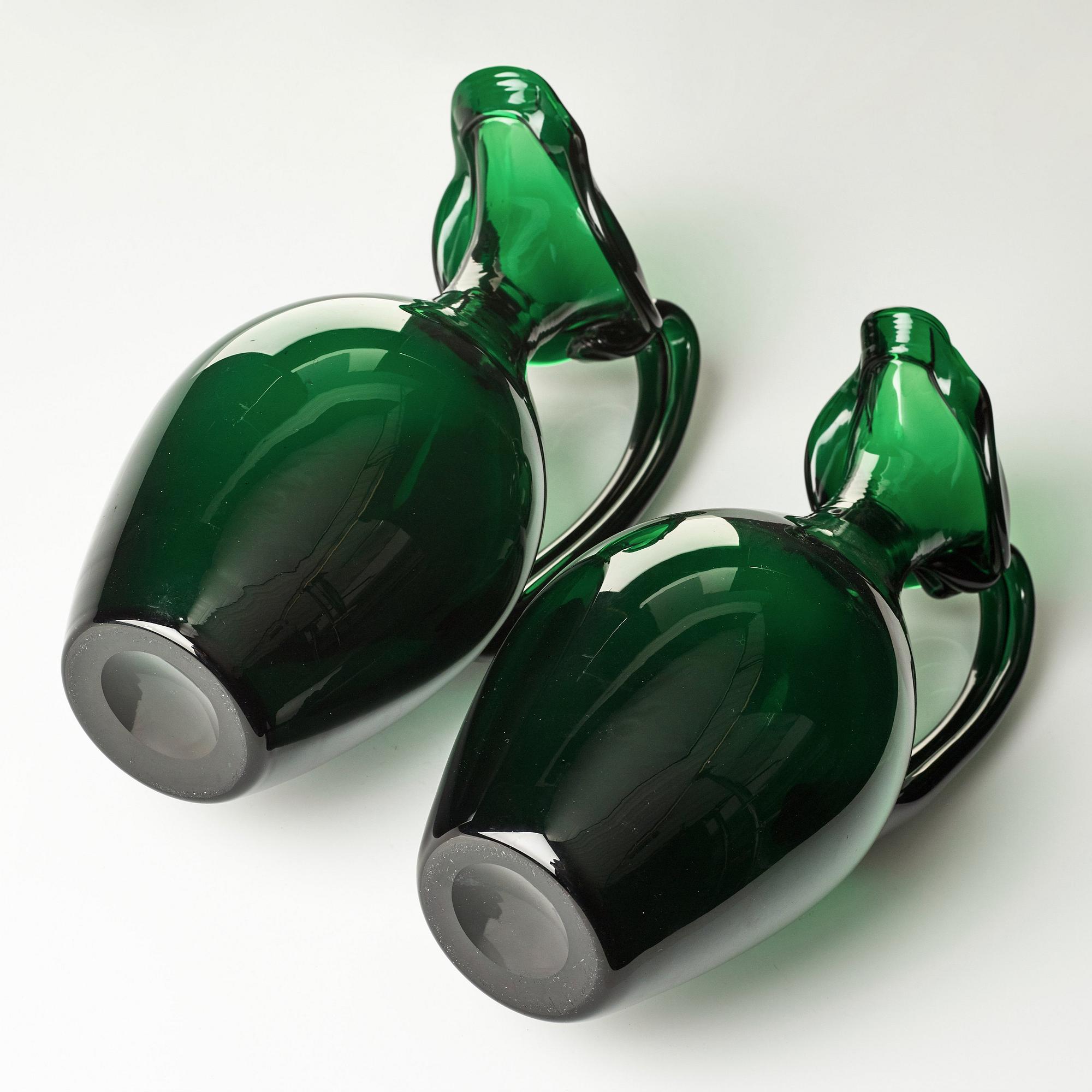Edward Hald, two emerald green claret jugs, Sandvik's glassworks, Sweden ca 1929, model HS 1021.