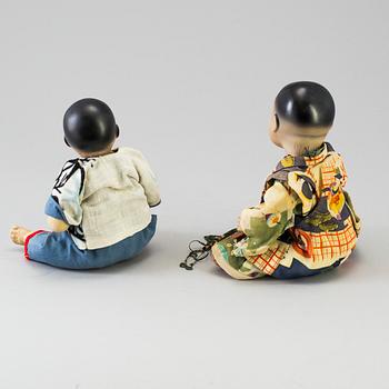 Two oriental bisque head baby dolls by Armand Marseille and Heubach Köppelsdorf, Germany, early 20th century.