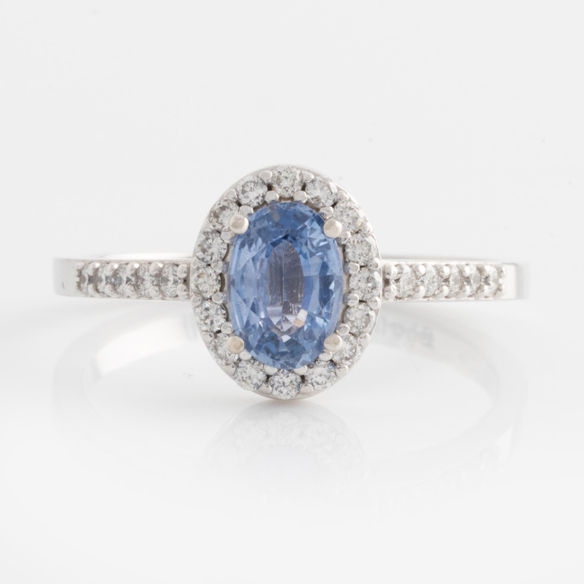 Ring with oval sapphire and brilliant-cut diamonds.