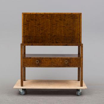 a mid 20th century birch bureau from Axel Larson, Bodafors, model number 954.