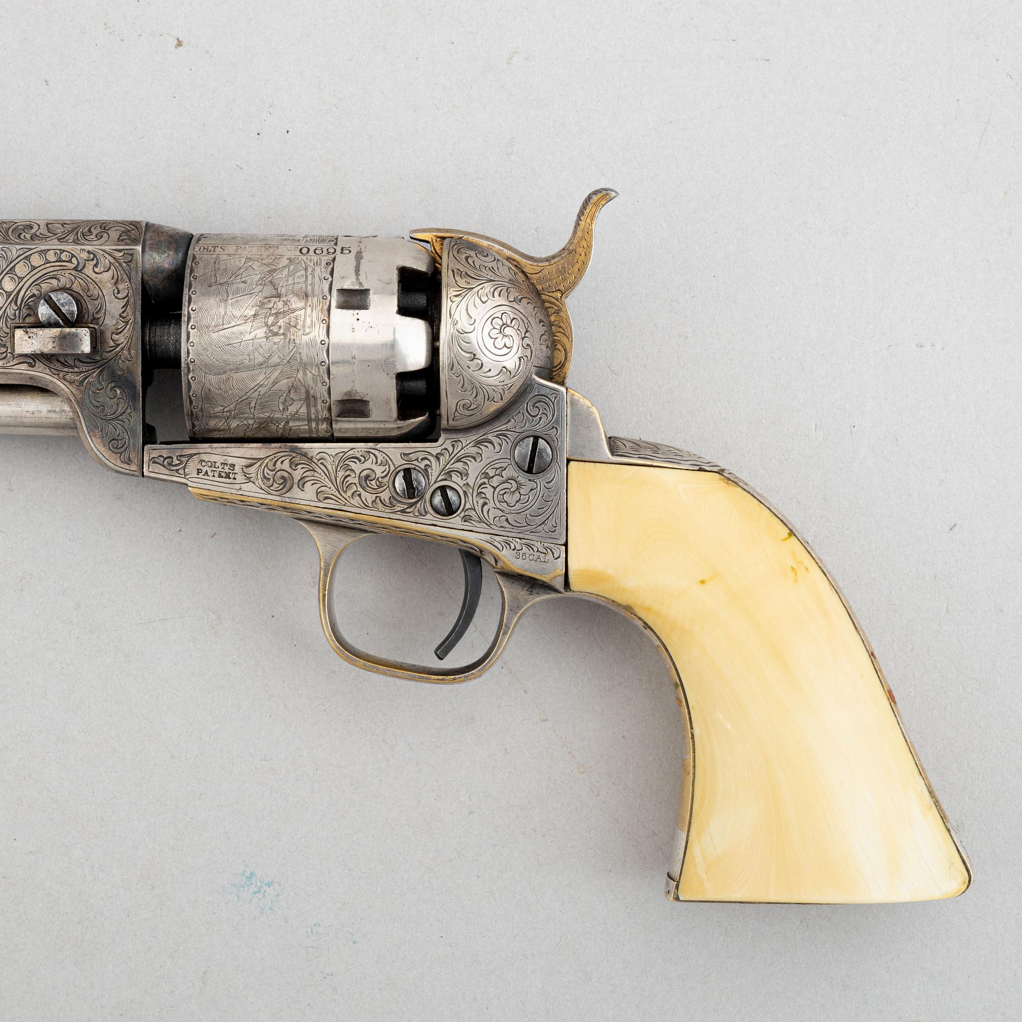 A percussion revolver, Colt 1851 Navy, in case, from the year 1863.
