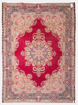 A carpet, Kirman, ca. 333 x 244 cm.