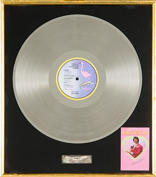 Gold record, "Kusela & Puppe ja Tunnelbanapojkar, Naurava Kulkuri".