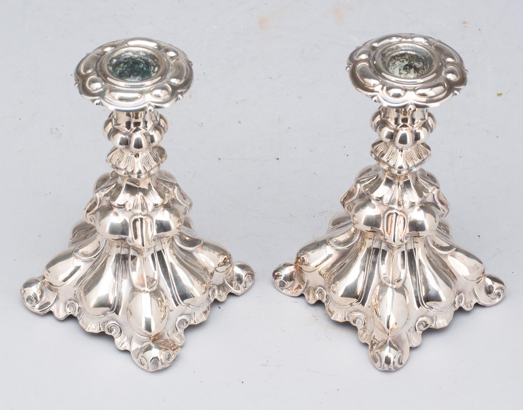 LJUSSTAKAR, silver. 1900-tal.