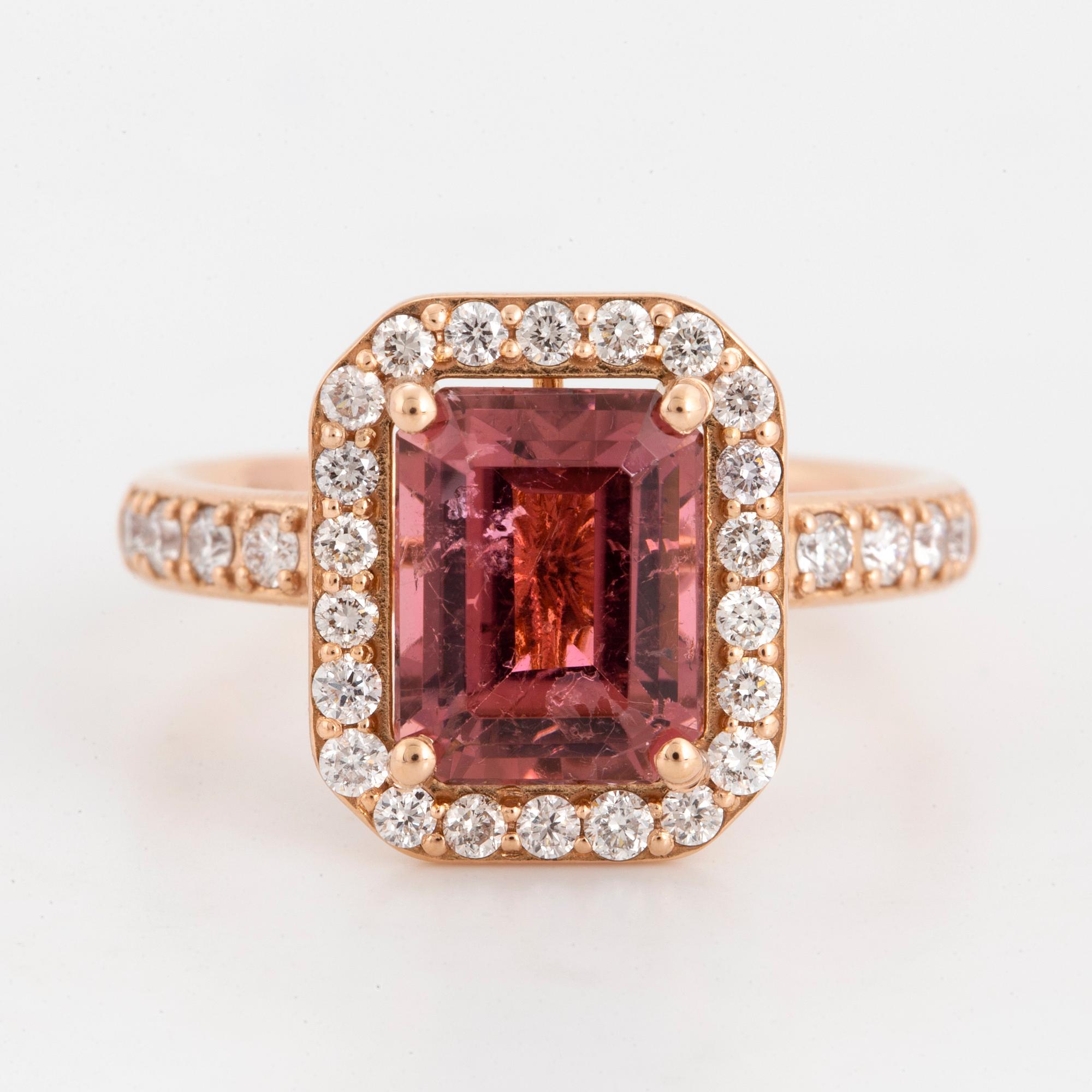 Emerald-cut pink tourmaline and brilliant-cut diamond ring.