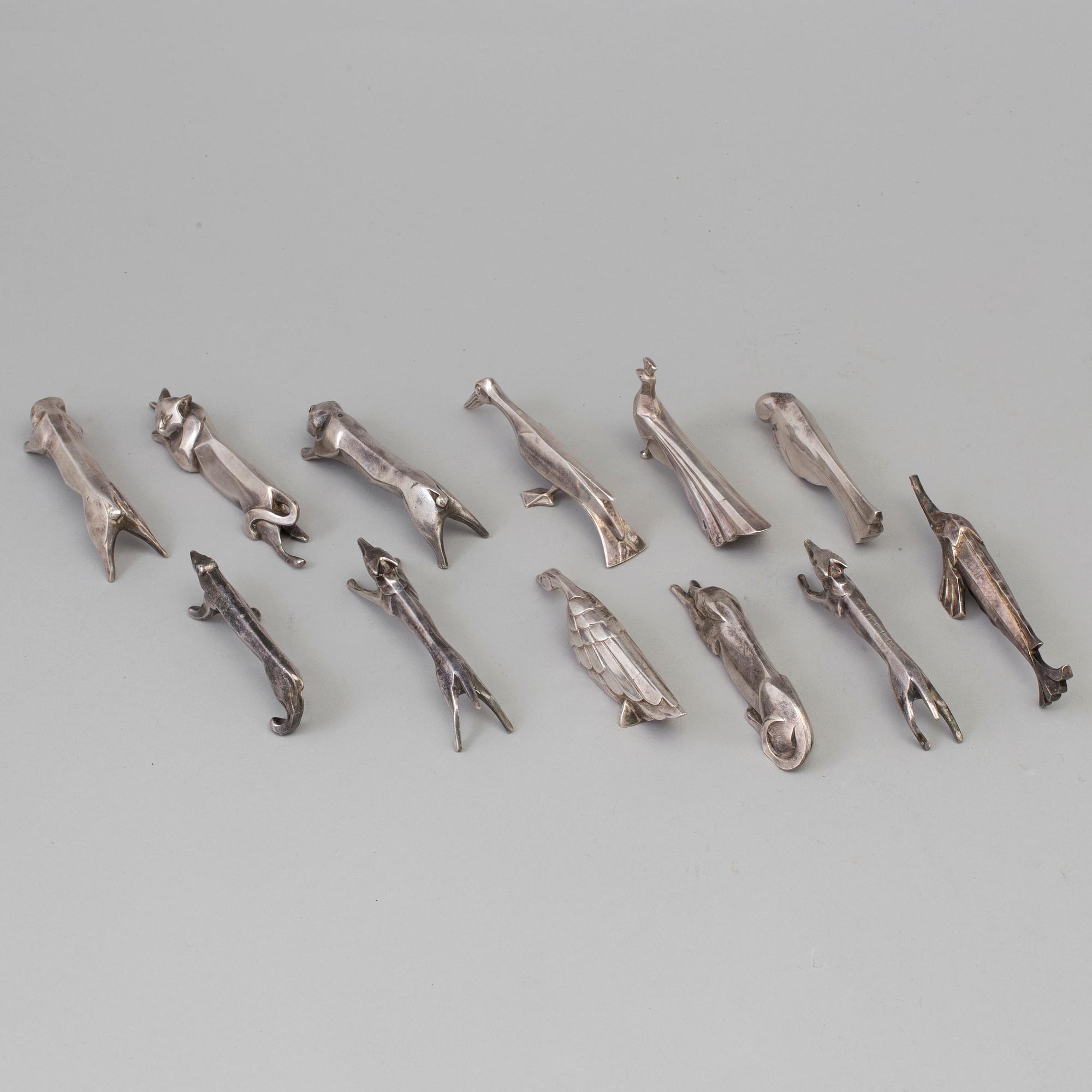 12 silver plated animal-shaped knife rests designed by Marcel Edouard Sandoz for Gallia Christofle, France.