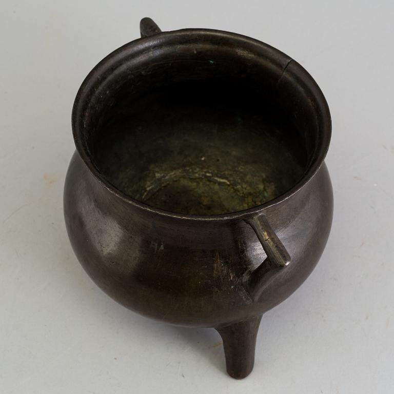 A medieval bronze pot.