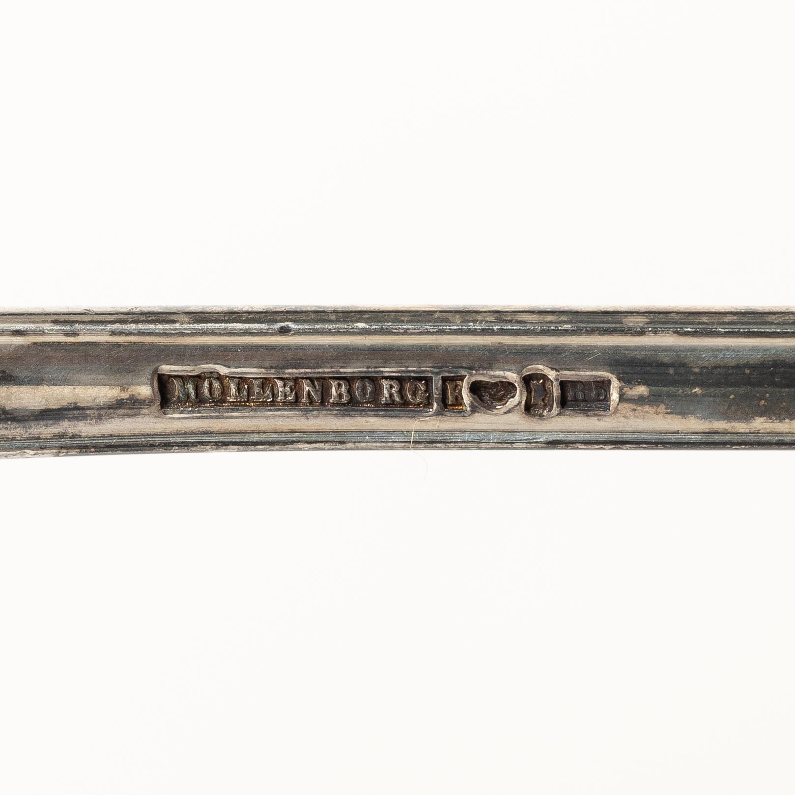 A Swedish silver soup ladle and a serving spoon, 19th Century.