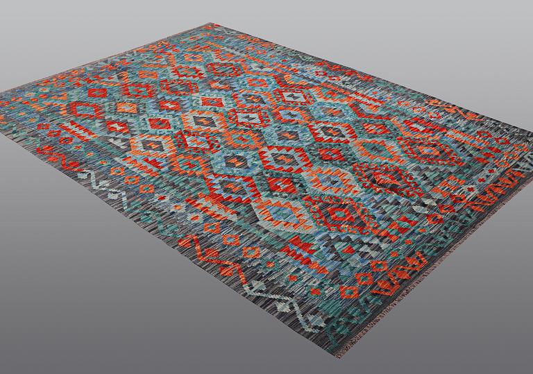 A rug, kilim, ca 252 x 179 cm.